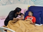 Ram Charan meets nine-year-old fan ailing from cancer at a hospital. Ram Charan meets nine-year-old fan ailing from cancer at a hospital.