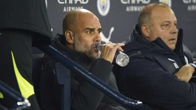 Manchester City's head coach Pep Guardiola sits on the bench before the English FA Cup 4th round match (AP) Manchester City's head coach Pep Guardiola sits on the bench before the English FA Cup 4th round match (AP)