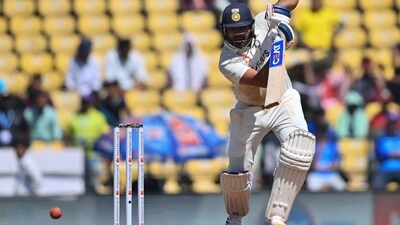 India's captain Rohit Sharma plays a shot during the second day of the first Test cricket match between India and Australia (AFP)