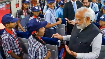 Prime Minister Narendra Modi interacts with school students during the flagging of ceremony of two Vande Bharat Express trains, in Mumbai. (PTI)