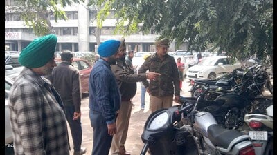 Police personnel checking the vehicles at mini-secretariat in Ludhiana on Friday. (HT Photo)