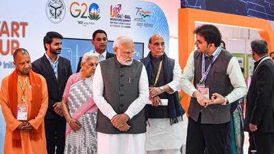 Prime Minister Narendra Modi with Uttar Pradesh governor Anandiben Patel, defence minister Rajnath Singh and Uttar Pradesh chief minister Yogi Adityanath at an exhibition organised during the Uttar Pradesh Global Investors Summit 2023, in Lucknow, on Friday. (PTI)