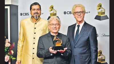 Ricky Kej, Herbert Waltl, and Stewart Copeland hold the award for Best Immersive Audio Album in the press room during the 65th Annual Grammy Awards at the Crypto.com Arena in Los Angeles on February 5, 2023 (AFP)