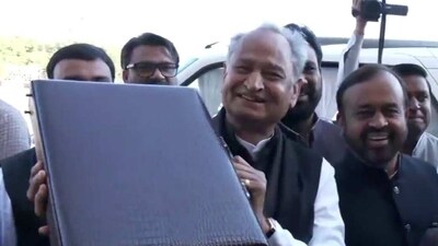 Rajasthan chief minister Ashok Gehlot with the Budget briefcase outside Rajasthan Assembly. (Twitter/ANI) Rajasthan chief minister Ashok Gehlot with the Budget briefcase outside Rajasthan Assembly. (Twitter/ANI)
