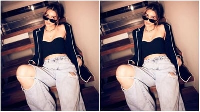 In a golden neck choker, golden earrings and tinted shades, Kriti further accessorised her look for the day. (Instagram/@kritisanon) In a golden neck choker, golden earrings and tinted shades, Kriti further accessorised her look for the day. (Instagram/@kritisanon)