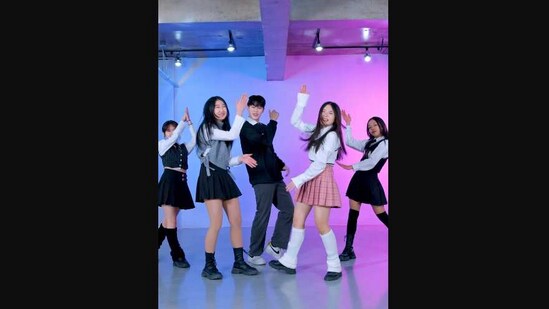 The image, taken from Instagram, shows a Korean dance group grooving to Shah Rukh Khan and Deepika Padukone’s Jhoome Jo Pathaan. (Instagram/@premiumdance_studio)