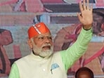 Gomati, Feb 11 (ANI): Prime Minister Narendra Modi waves during the Vijay Sankalp Rally at Radhakishorepur ahead of the Tripura Legislative Assembly election, in Gomati on Saturday. Gomati, Feb 11 (ANI): Prime Minister Narendra Modi waves during the Vijay Sankalp Rally at Radhakishorepur ahead of the Tripura Legislative Assembly election, in Gomati on Saturday.