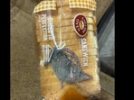 Man claims to have found a mouse in his bread packet. Man claims to have found a mouse in his bread packet.
