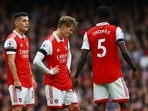 Arsenal's Martin Odegaard, Granit Xhaka and Thomas Partey react during the match.