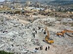 Rescuers searching for survivors amidst the rubble of collapsed buildings in Syria. Rescuers searching for survivors amidst the rubble of collapsed buildings in Syria.