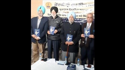 (From left) Singh Sabha governing body member Gurpreet Singh, Swaran Singh Boparai, author Ashok Singh Bagarian andwriter-editor Swarajbirat during the book launch in Sector 28, Chandigarh, on Saturday. (HT Photo)