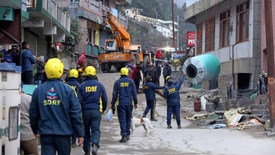 NDRF and SDRF personnel deployed near the damaged hotels that were demolished after coming under the red zone in Joshimath, (ANI) NDRF and SDRF personnel deployed near the damaged hotels that were demolished after coming under the red zone in Joshimath, (ANI)