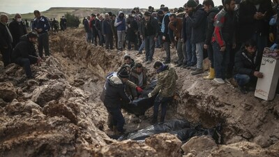 Tens of thousands of local and international rescue workers are still scouring through flattened neighbourhoods despite freezing weather. (AP) Tens of thousands of local and international rescue workers are still scouring through flattened neighbourhoods despite freezing weather. (AP)