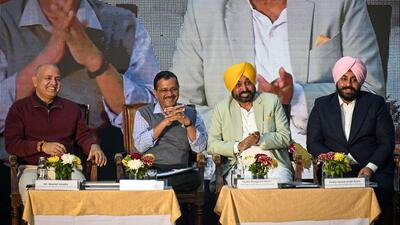 From left: Delhi deputy chief minister Manish Sisodia, Delhi CM Arvind Kejriwal, Punjab CM Bhagwant Mann and Punjab education minister Harjot Singh Bains during an interaction session with principals of Punjab and Delhi government schools after their foreign training, on Saturday. (Sanchit Khanna/HT)