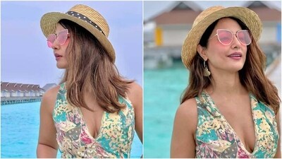 Actor Hina Khan jetted off to the film industry's favourite tropical holiday destination Maldives for a laidback vacation. The star took a break from work and decided to chill amid clear blue water, tropical breeze, white sand beaches and palm trees at the island nation. Earlier, she dropped pictures of herself arriving in the Maldives, and her latest photos show her chilling in a floral maxi dress. (Instagram) Actor Hina Khan jetted off to the film industry's favourite tropical holiday destination Maldives for a laidback vacation. The star took a break from work and decided to chill amid clear blue water, tropical breeze, white sand beaches and palm trees at the island nation. Earlier, she dropped pictures of herself arriving in the Maldives, and her latest photos show her chilling in a floral maxi dress. (Instagram)
