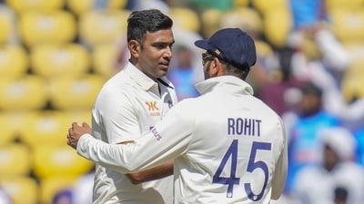 Ravichandran Ashwin, left, gets a tap on the shoulder from captain Rohit Sharma for his five-wicket haul during the third day of the first cricket test match between India and Australia in Nagpur. (AP) Ravichandran Ashwin, left, gets a tap on the shoulder from captain Rohit Sharma for his five-wicket haul during the third day of the first cricket test match between India and Australia in Nagpur. (AP)