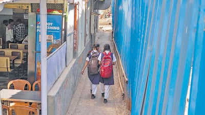 Mumbai, India - February 07, 2023: Access lanes between two buildings in Tagore Nagar and Kannamwar Nagar that are used by citizens to go to bus stops and other side of the colony ,at Vikhroli (East), in Mumbai, India, on Tuesday, February 07, 2023. (Photo by Satish Bate/ Hindustan Times) (Satish Bate/HT PHOTO) Mumbai, India - February 07, 2023: Access lanes between two buildings in Tagore Nagar and Kannamwar Nagar that are used by citizens to go to bus stops and other side of the colony ,at Vikhroli (East), in Mumbai, India, on Tuesday, February 07, 2023. (Photo by Satish Bate/ Hindustan Times) (Satish Bate/HT PHOTO)