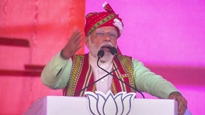 Prime Minister Narendra Modi speaks during a 'Vijay Sankalp Rally' for the upcoming Tripura assembly election at Ambassa in Dhalai district on Saturday, (PTI)