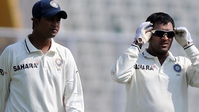 File image of MS Dhoni, Pragyan Ojha (Getty Images) File image of MS Dhoni, Pragyan Ojha (Getty Images)