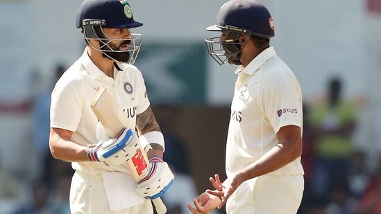 Indian skipper Rohit Sharma interacts with Virat Kohli during Day two of the 1st Test match between India and Australia (BCCI Twitter)