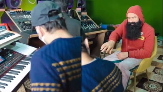 Dera chief Gurmeet Ram Rahim Singh instructing a musician.