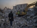 A man stands on top of the rubble of his house destroyed during an earthquake in Antakya, southeastern Turkey. A man stands on top of the rubble of his house destroyed during an earthquake in Antakya, southeastern Turkey.