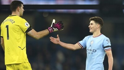 Manchester City's Julian Alvarez, right, greets Aston Villa's goalkeeper Emiliano Martinez after the English Premier League match (AP) Manchester City's Julian Alvarez, right, greets Aston Villa's goalkeeper Emiliano Martinez after the English Premier League match (AP)