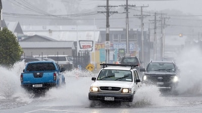New Zealand Floods: Cars move through flooded roads in the northern New Zealand city of Whangarei. (AP) New Zealand Floods: Cars move through flooded roads in the northern New Zealand city of Whangarei. (AP)