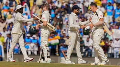 Indian cricketers Rohit Sharma and Ravindra Jadeja greet Australian cricketers Steve Smith and Scott Boland after the end of the 1st Test cricket match (PTI)