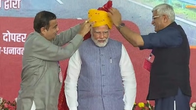 Prime Minister Narendra Modi on Sunday inaugurated the phase (a 246-km section) of the Delhi-Mumbai Expressway in Rajasthan's Dausa. In this photo, PM Modi can be seen being felicitated by Union Minister for Road Transport and Highways Nitin Gadkari and Union Minister for Jal Shakti Gajendra Singh Shekhawat. (PTI) Prime Minister Narendra Modi on Sunday inaugurated the phase (a 246-km section) of the Delhi-Mumbai Expressway in Rajasthan's Dausa. In this photo, PM Modi can be seen being felicitated by Union Minister for Road Transport and Highways Nitin Gadkari and Union Minister for Jal Shakti Gajendra Singh Shekhawat. (PTI)