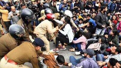 Police personnel detain protestors during the demonstration (ANI Photo) Police personnel detain protestors during the demonstration (ANI Photo)