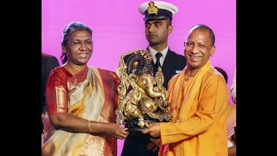 President Droupadi Murmu being felicitated by Uttar Pradesh chief minister Yogi Adityanath at the closing ceremony of UP Global Investors Summit, in Lucknow on Sunday. (PTI) President Droupadi Murmu being felicitated by Uttar Pradesh chief minister Yogi Adityanath at the closing ceremony of UP Global Investors Summit, in Lucknow on Sunday. (PTI)