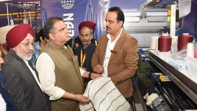 Rajya Sabha member Sanjeev Arora touring the GMMSA exhibition in Ludhiana. (HT Photo)