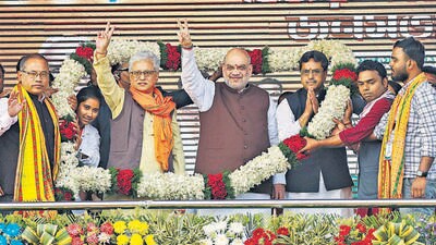 Union minister Amit Shah with Tripura chief minister Manik Saha (on his right) at a ‘Vijay Sankalp Rally’ at Charilam in the state’s Sepahijala district on Sunday. (PTI) Union minister Amit Shah with Tripura chief minister Manik Saha (on his right) at a ‘Vijay Sankalp Rally’ at Charilam in the state’s Sepahijala district on Sunday. (PTI)