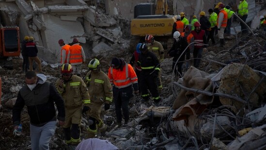 Rescue workers continue the search for victims of the earthquake in Syria. (AP)