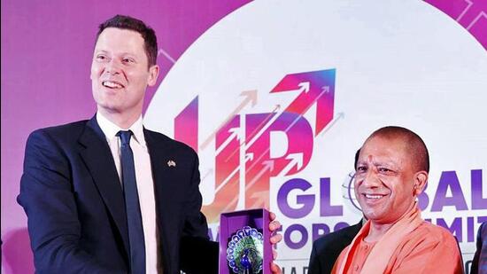 British minister Alex Chalk with Uttar Pradesh chief minister Yogi Adityanath at UP Global Investors Summit in Lucknow on Sunday. (ANI PHOTO)