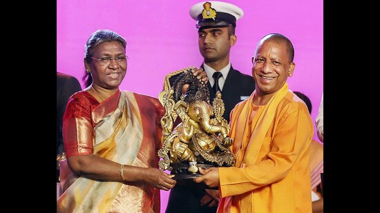 President Droupadi Murmu being felicitated by Uttar Pradesh chief minister Yogi Adityanath at the closing ceremony of UP Global Investors Summit, in Lucknow on Sunday. (PTI)