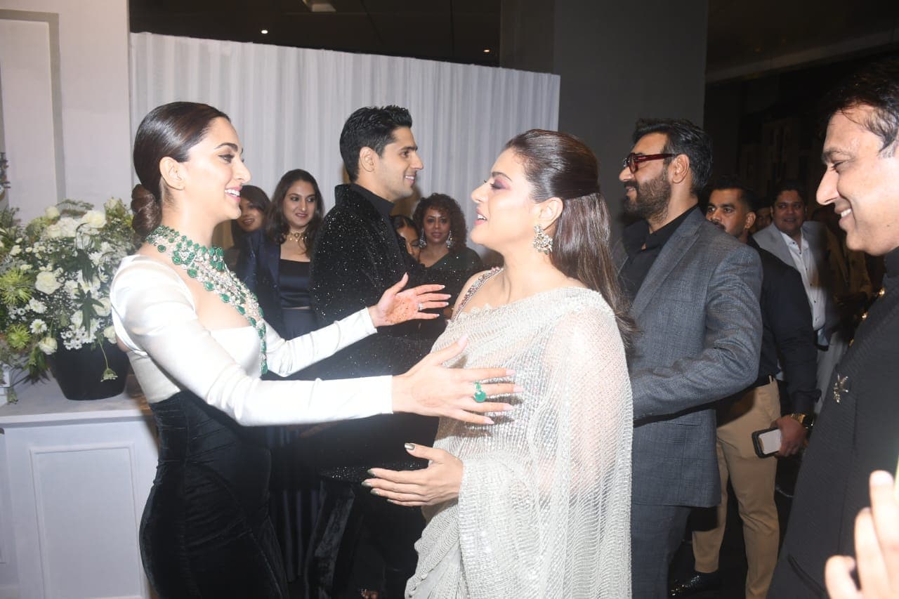 Kiara and Sid welcomed Kajol and Ajay Devgn to the party. Kiara and Sid welcomed Kajol and Ajay Devgn to the party.
