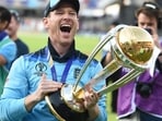 Eoin Morgan celebrates with the World Cup trophy on the pitch after the 2019 Cricket World Cup final Eoin Morgan celebrates with the World Cup trophy on the pitch after the 2019 Cricket World Cup final