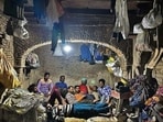 This is the extraordinary residence of a bunch of men who haul construction material on wooden carts. This is the extraordinary residence of a bunch of men who haul construction material on wooden carts.