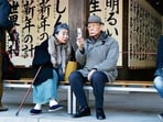 An elderly couple in Tokyo, Japan. An elderly couple in Tokyo, Japan.