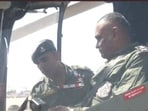 Screengrab of the video showing Army chief Manoj Pande flying in a LCH at Aero show, Bengaluru, on Monday. Screengrab of the video showing Army chief Manoj Pande flying in a LCH at Aero show, Bengaluru, on Monday.