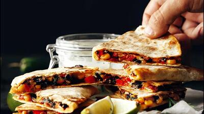Frozen Mexican multigrain quesadillas stuffed with refried beans, veggies and smoked cheese by TKC Foods. The brand offers frozen gourmet meals in various cuisines such as Indian, American, Italian, Mexican and Oriental