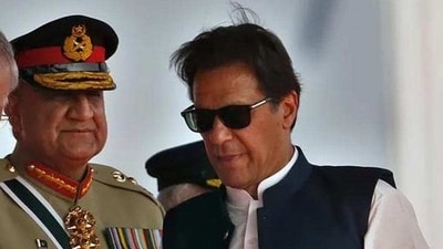 Imran Khan with ex-Pakistan Army chief Qamar Javed Bajwa. (AP File) Imran Khan with ex-Pakistan Army chief Qamar Javed Bajwa. (AP File)
