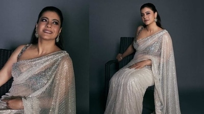 For the reception, Kajol wore a glittering embellished sari, paired with traditional earrings. For the reception, Kajol wore a glittering embellished sari, paired with traditional earrings.