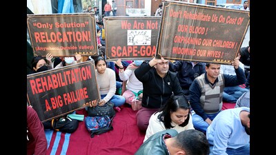 Kashmiri pandits and employees holding placards stage a protest demanding relocation, in Jammu on Monday. (Shilpa Thakur)