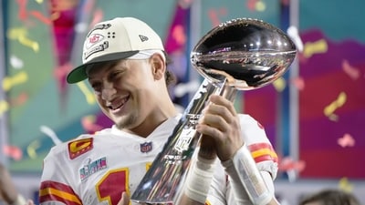 Kansas City Chiefs quarterback Patrick Mahomes (15) holds the trophy after their win against the Philadelphia Eagles in the NFL Super Bowl 57 (AP) Kansas City Chiefs quarterback Patrick Mahomes (15) holds the trophy after their win against the Philadelphia Eagles in the NFL Super Bowl 57 (AP)