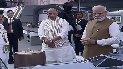 PM Modi reviews defense-related products at India pavilion in Bengaluru (ANI) PM Modi reviews defense-related products at India pavilion in Bengaluru (ANI)