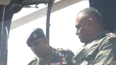 Screengrab of the video showing Army chief Manoj Pande flying in a LCH at Aero show, Bengaluru, on Monday. (ANI) Screengrab of the video showing Army chief Manoj Pande flying in a LCH at Aero show, Bengaluru, on Monday. (ANI)