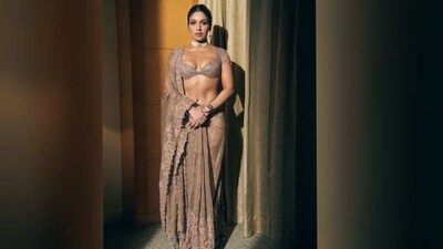 Bhumi played muse to the fashion designer Tarun Tahiliani and picked up a stunning shimmery lehenga choli set. Her styling was done by celebrity stylist Mohit Rai and Shubhi Kumar. (Instagram/@bhumipedneker) Bhumi played muse to the fashion designer Tarun Tahiliani and picked up a stunning shimmery lehenga choli set. Her styling was done by celebrity stylist Mohit Rai and Shubhi Kumar. (Instagram/@bhumipedneker)
